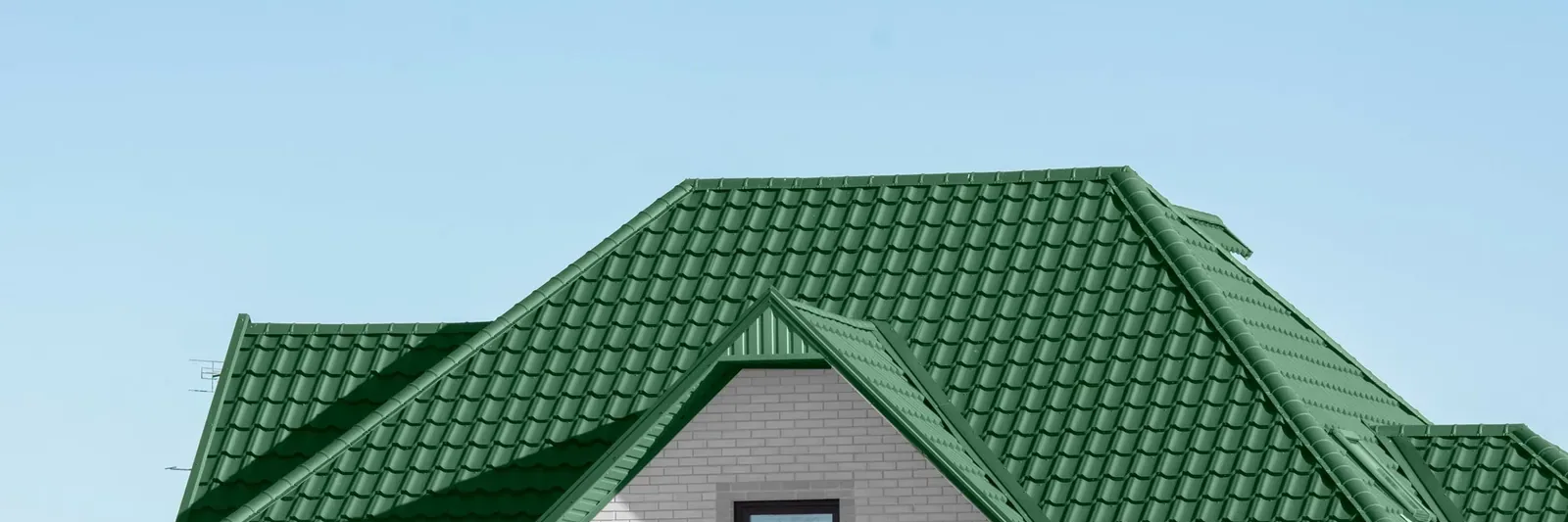 An Ontario home with a green metal roof