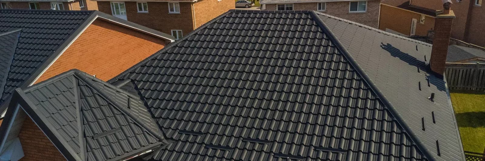 A low-slope metal roof section on an Ontario building