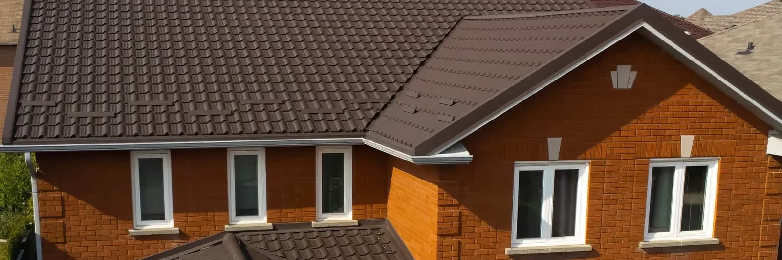 Several metal roof profiles on Ontario homes