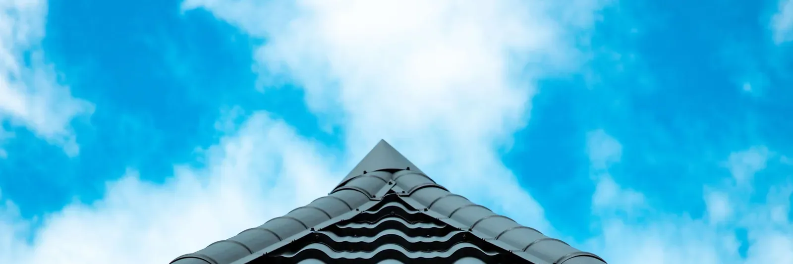 Rain falling on a metal roof on an Ontario home