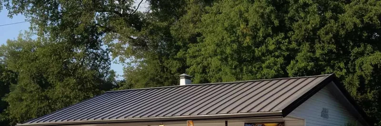 A metal roof over a garage and porch