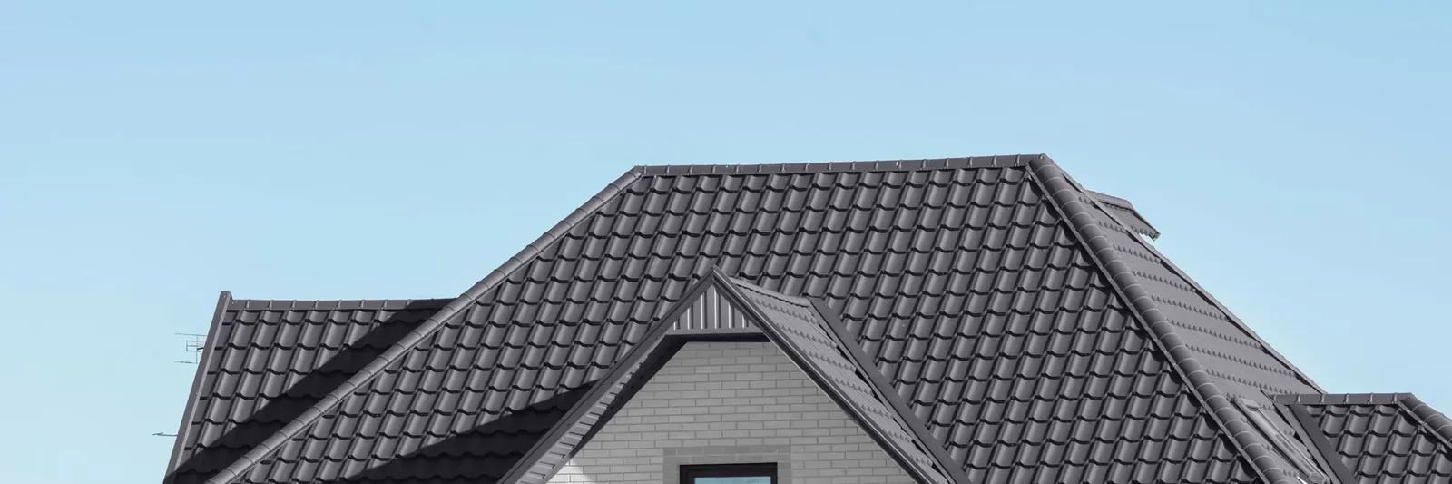 An Ontario home with a grey metal roof